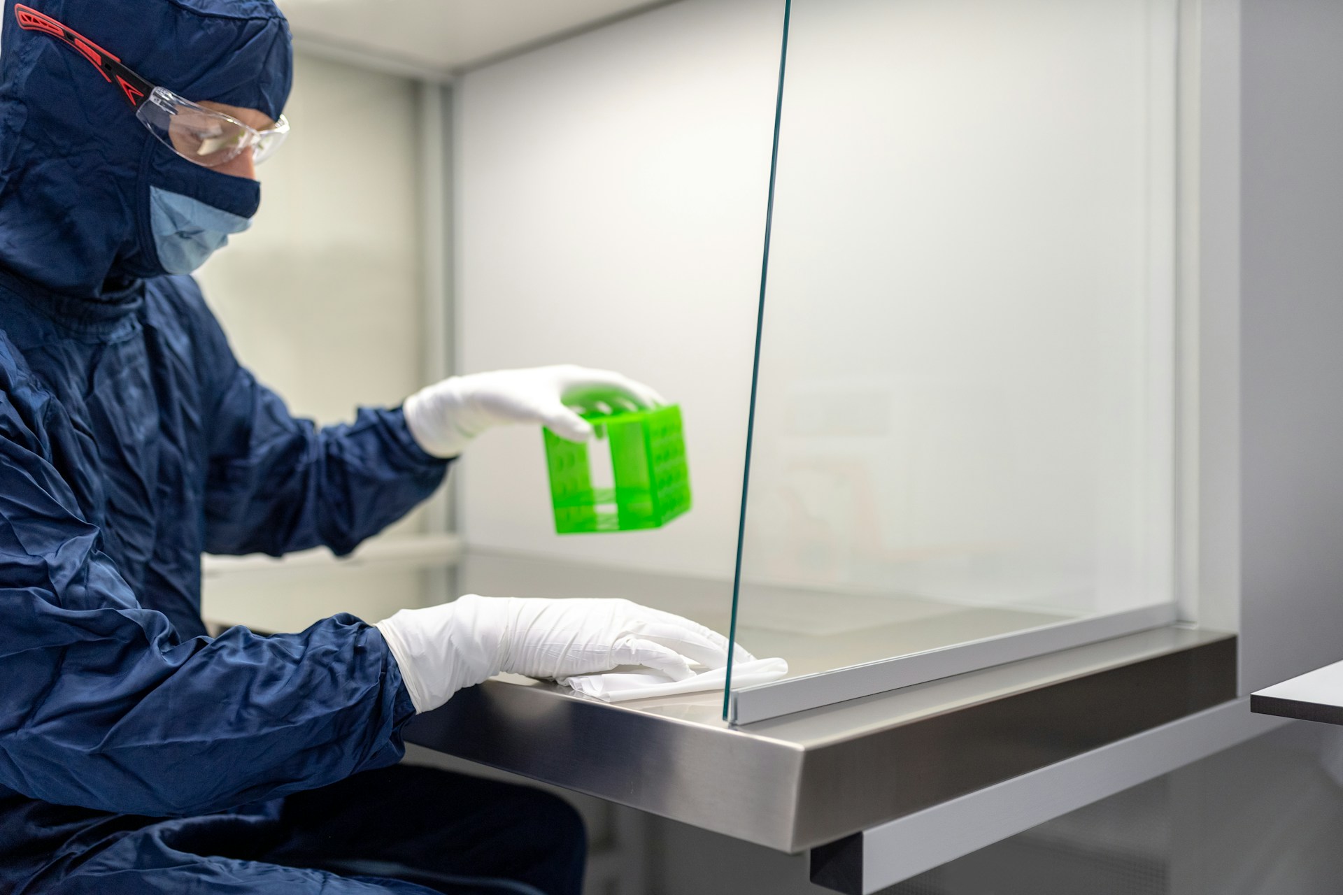 Laboratory personnel cleaning laboratory